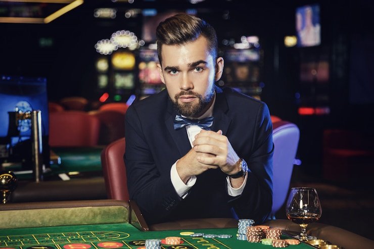 Blackjack tournament table with chip stacks, dealer, and live video feed from ada4d studio